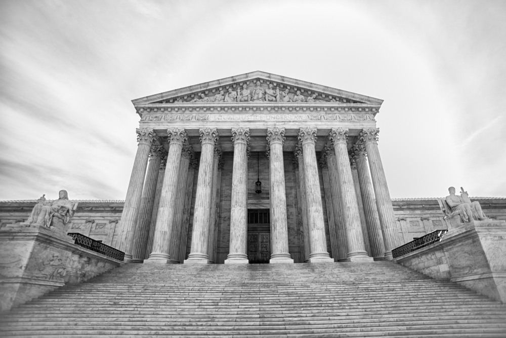 Black and white image of the US The Supreme Court.