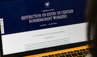 laptop screen displaying proclamation on new H-1B fee